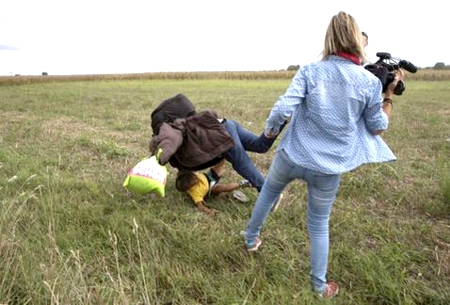 Indignación-mundial-por-video-de-mujer-periodista-pateando-a-inmigrantes.jpg