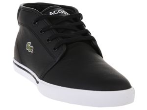 tenis de cuero negro y suela blanca